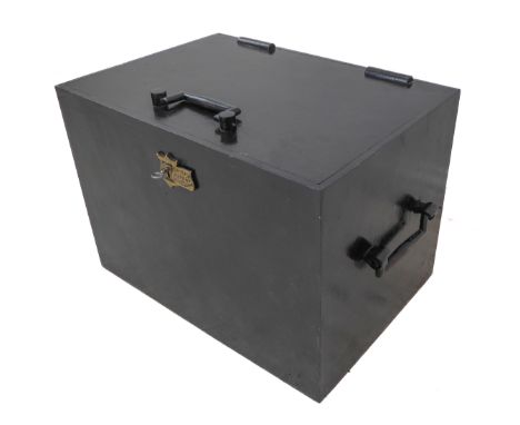 A large and heavy black-painted ironwork strongbox; two side carrying handles, the hinged section with a further single centr