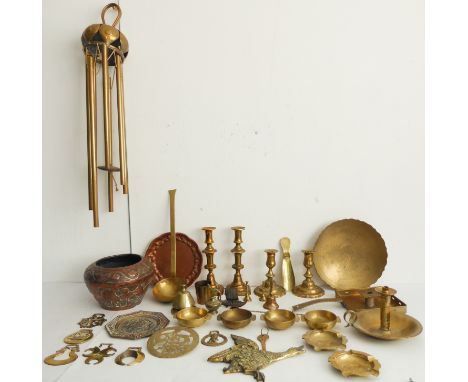An assortment of mostly late 19th / early 20th century metalware to include candlesticks, a brass ornamental flying duck, tra