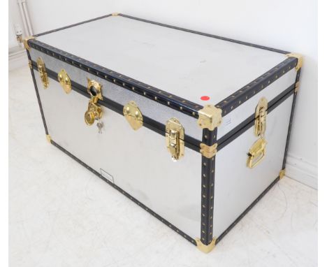 A silver-coloured metal-mounted storage trunk (97cm wide x 62cm deep x 56cm high)
