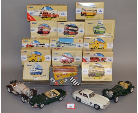 Fourteen boxed Corgi Classics diecast model vehicles, including buses and fire appliances, all appear generally G/G+ in G+ bo