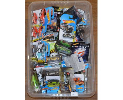 Good quantity of Mattel Hot Wheels diecast models, including Ghostbusters, Porsche Series, Batman vs Superman, etc. All carde