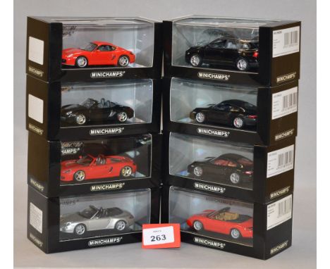 Minichamps. Eight Porsche 911 diecast model cars in 1:43 scale including Boxster and Cayman S versions, a Cayenne GTS and a C