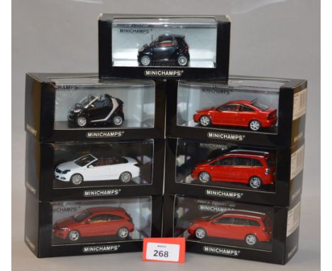 Minichamps. Five Opel diecast model cars in 1:43 scale including Coupe, Zafira OPC, Astra Twin Top, GTC and Caravan variants 
