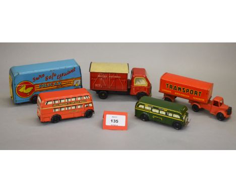 Five unboxed vintage tinplate and plastic models with clockwork and friction drive including a Chad Valley 'British Railways'