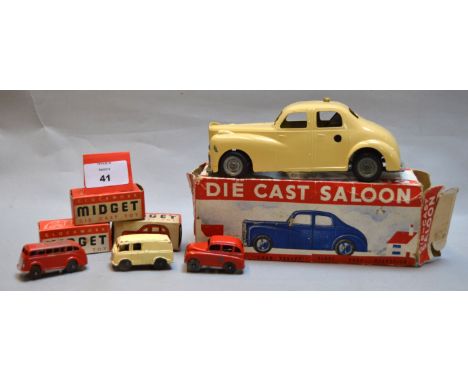 Four boxed Chad Valley diecast models including a large scale clockwork  'Die Cast Saloon' in cream, overall appears F/G in F