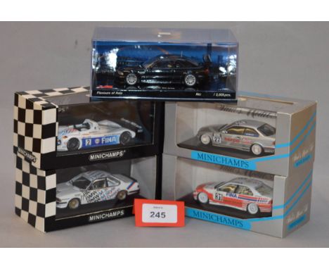 Minichamps. Five BMW diecast model cars in 1:43 scale  including 318i, 325i Coupe, 635 CSi and V12 Le Mans variants together 