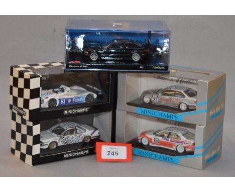 Minichamps. Five BMW diecast model cars in 1:43 scale  including 318i, 325i Coupe, 635 CSi and V12 Le Mans variants together 