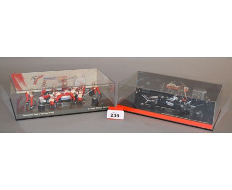 Minichamps. Two boxed 1:43 scale diorama model sets, McLaren Mercedes and Panasonic Toyota Racing. All are boxed and E. (2)