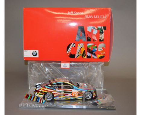 BMW Art Car 1:18 scale BMW M3 GT2 Jeff Koons diecast model. Includes BMW Classic Live Special magazine, but not Art Car bookl