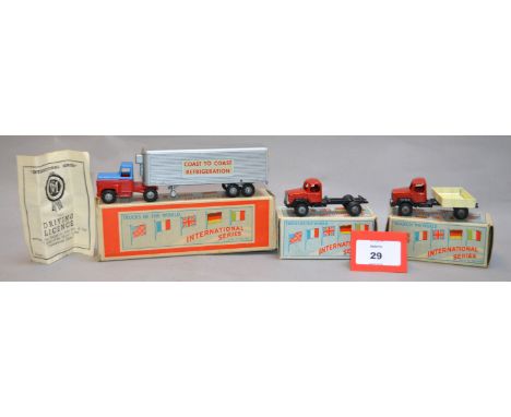 Three boxed diecast model trucks from the Morestone 'Trucks of the World  International Series', an Articulated International