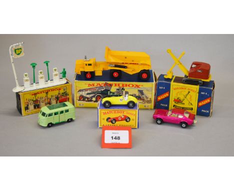 Four boxed Matchbox diecast models, 52a Maserati in lemon with wire wheels G in reproduction box, Major Pack #4 Ruston Bucyru