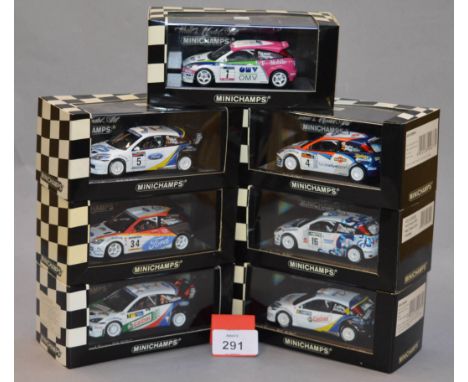 Minichamps. Seven Ford Focus diecast model cars in 1:43 scale  including RS WRC cars 400 038305 (L. Ed. 1008), 430 028904 (L.