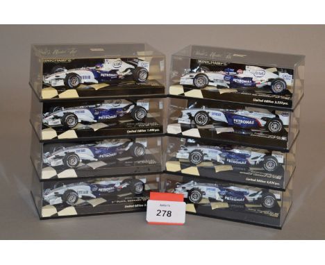 Minichamps. Eight BMW Sauber diecast model Racing Cars in 1:43 scale including F1.06 and F1.07 variants. Four of the models a