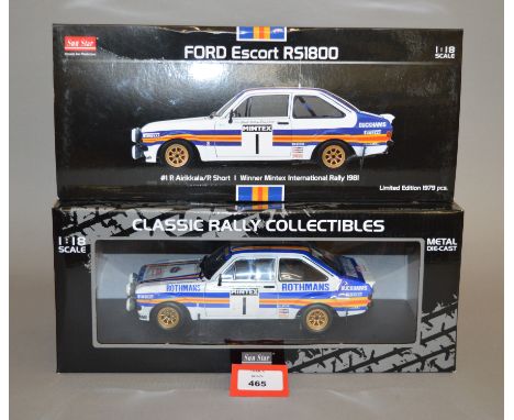 Three boxed Ford Escort diecast models in 1:18 scale including a Sun Star RS1800, a Greenlight RS2000 Mk I and a Triple 9 Col