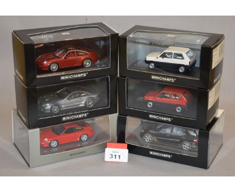 Minichamps. Two Porsche 911 diecast model cars in 1:43 scale, 997 and Targa 4S models, two Mercedes Benz cars, M class and an