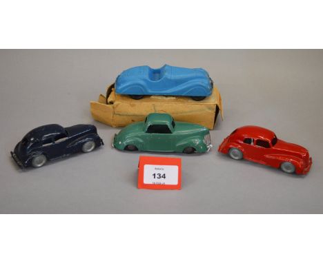 An unboxed B.P. (Denmark) Ford V8 Coupe diecast model in green, F, together with two unboxed Betal Products Saloon Car diecas