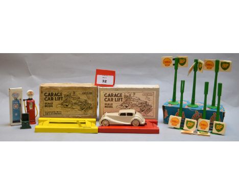A boxed group of Crescent Toys Garage related diecast models including a Garage Car Lift with car, yellow ramp and oil bin, G