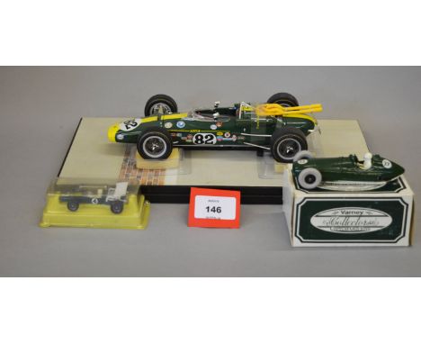 A mixed group of boxed diecast, tinplate and plastic model cars in a variety of different scales,  including  a Tri-ang batte