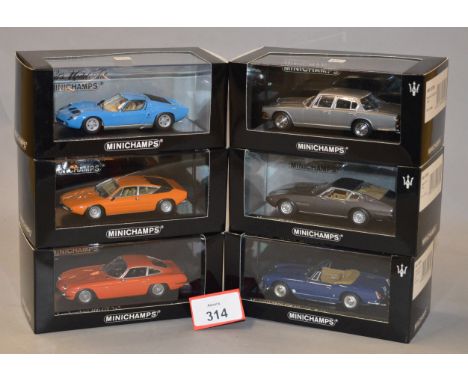 Minichamps. Three Maserati diecast model cars in 1:43 scale, Quattroporte, Ghibli and a 3500 GT Vignale Spider together with 