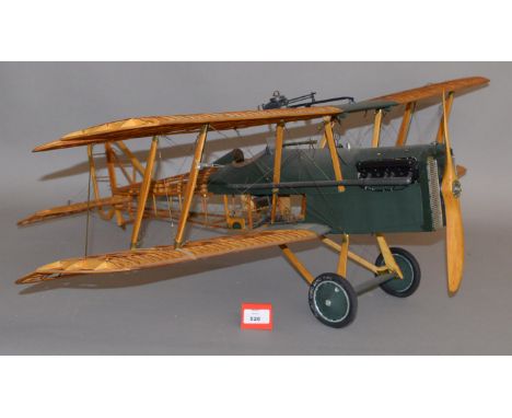 A wooden model SE5 aeroplane, possibly 1:8 scale, with working parts, length approx. 80cm, wingspan approx. 95 cm.