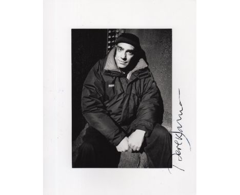 JARMAN DEREK: (1942-1994) English Film Director. Signed 8 x 10 photograph of Jarman seated in a three quarter length pose. Si