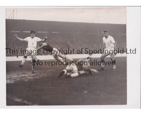 PRESS PHOTO / WEST HAM UNITED V ARSENAL 1958      Original 10" x 8" B/W Press photo with stamp and paper notation on the reve