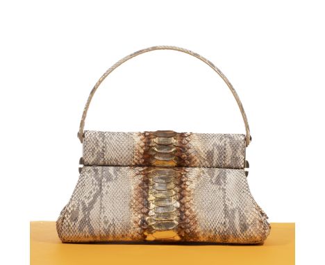 Christian DIOR, Collection Prêt à Porter Croisière 2008, sac 'Vanity babe'.En Python naturel lustré or et argent (Python molu