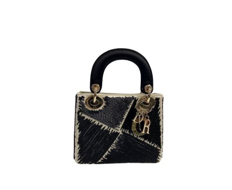 Christian DIOR, Collection Prêt à Porter Automne-Hiver 2012, Sac 'Mini Lady Dior'.Directeur artistique: John Galliano. En soi