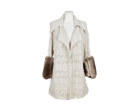 Christian DIOR Boutique, Collection Prêt à Porter, circa 2004. Cardigan long.Directeur artistique: John Galliano. En maille f