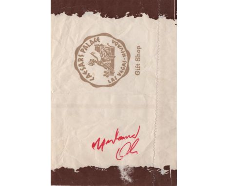 ALI MUHAMMAD: (1942-2016) American Boxer, World Heavyweight Champion. Bold red ink signature ('Muhammad Ali') to a clear area