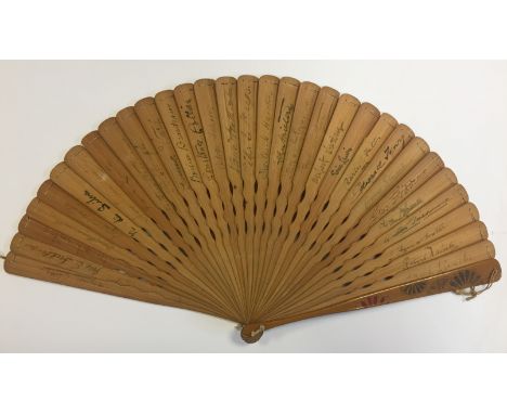 THEATRE: A wooden handheld fan featuring a painted decoration of several Japanese ladies in traditional clothing, various flo