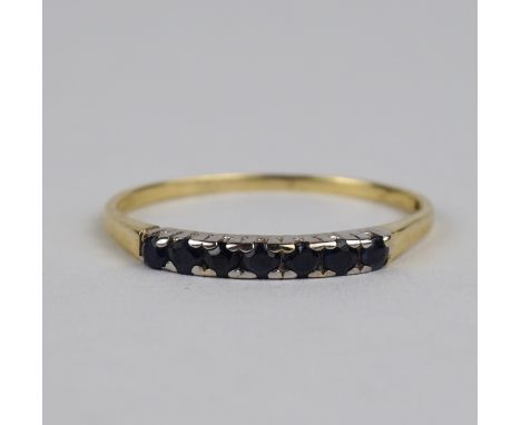 Ring mit 8 kleinen Saphiren, 585er Gold, Gew.1,25g runde, facettierte Steine, nebeneinander in Krappenfassung, U.57