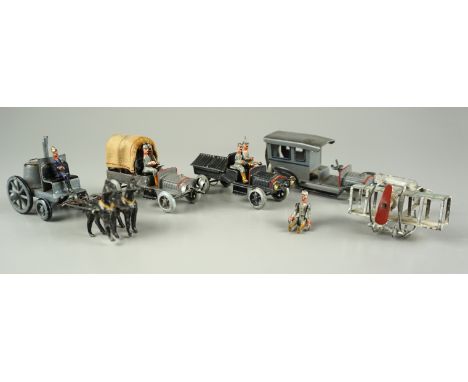 Konvolut Miniatur-Militärfahrzeuge mit Soldaten, Zinn, 1. WK 6 Vollfiguren, H. je ca. 29mm; davon 1x mit beweglichen Gliedmaß