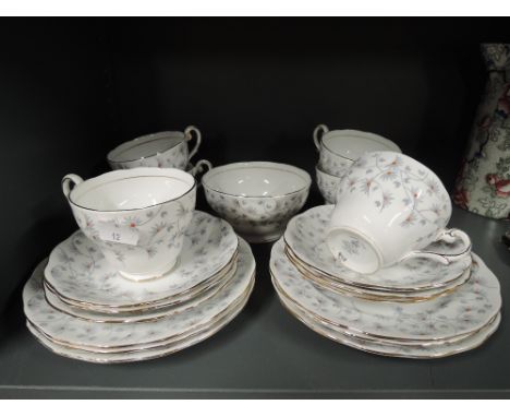 A vintage part tea service by Royal Standard in the Vanity Fair pattern