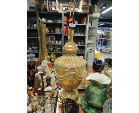 A large gilt effect table lamp
