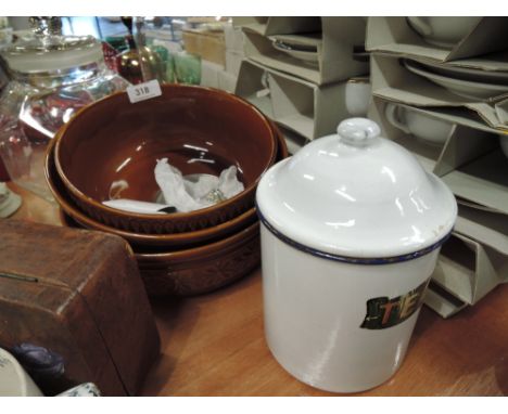 A selection of vintage kitchen wares and enamel tea tin