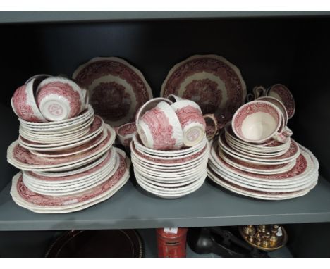 A selection of vintage ceramic dinner wares by Masons and Adams in a red and white palette