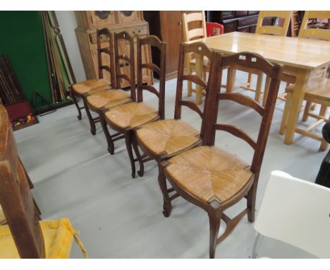 A set of 4 french style ladder back dining chairs