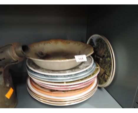 A selection of vintage ceramic plates and similar