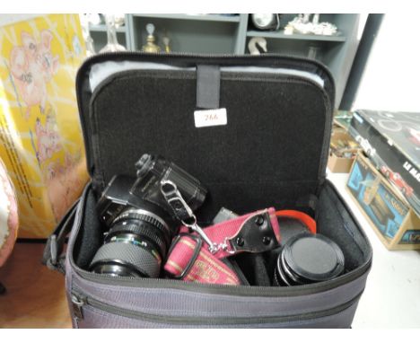 A Jenaflex electronic camera by Carl Zeiss Jena with Practka lenses , flash gun and soft carry bag