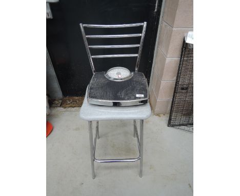 A kitchen stool and bathroom scale