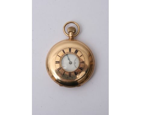 A 9ct gold cased half hunter pocket watch, maker JW Benson button wind working order, with a 15 jewel movement.