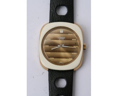 A vintage Tissot Astrolon watch Automatic with interchangeable outer plastic bezel.