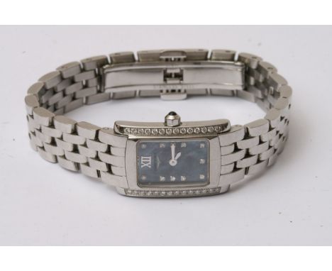 A cased Longines wrist watch with mother of pearl diamond surround steel bracet