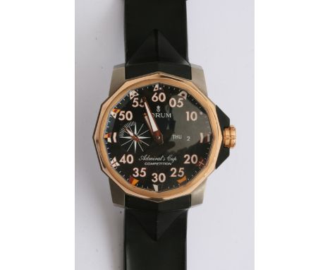 A large 48mm Titanium and 18k gold Gents Corum Admirals Cup competition watch, this model has an 18mm rose gold outer bezel a