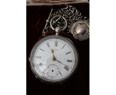 A Silver cased button wind pocket watch with attached watch chain, the watch with makers inscription to the dial The Farringd