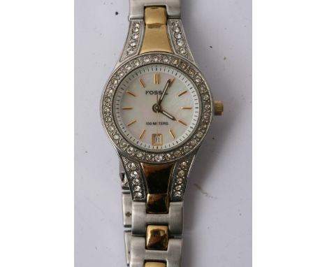 A boxed Fossil Ladies watch, running