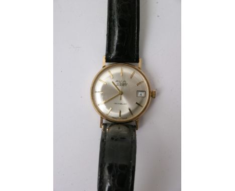 An unusual model 9ct gold Avia, magic Incabloc, Automatic 25 Jewel Gents watch, with date aperture. Working order.
