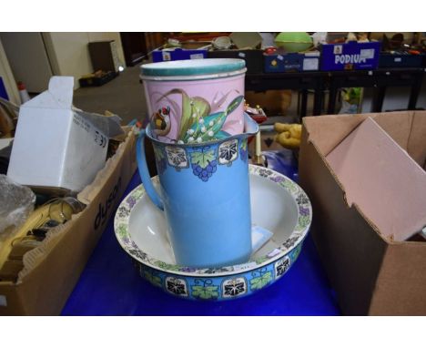 Polychrome wash bowl with associated jug and a ceramic planter