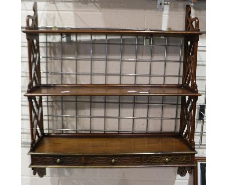 Victorian mahogany graduated tiered hanging three-shelf unit with three drawers and fretwork cut oriental sides and drawer fr